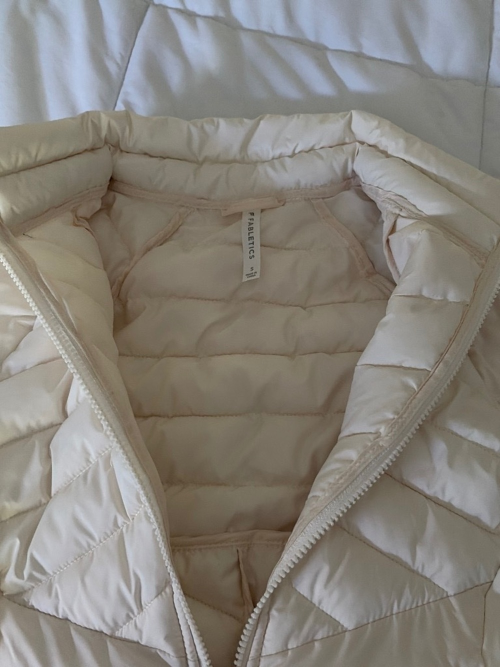 Brand new Fabletics white puffer coat